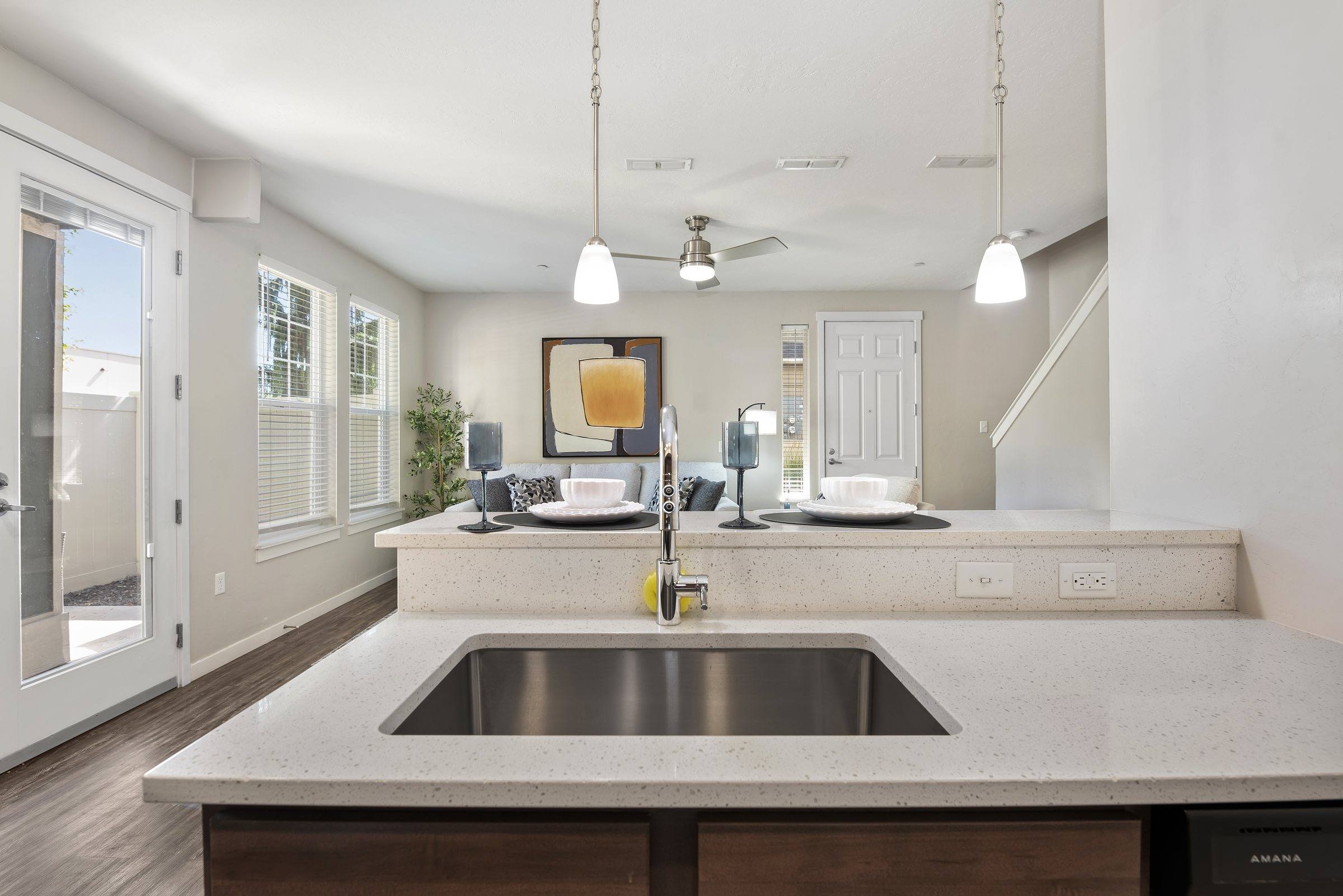 Kitchen island with counter seating in a model townhome