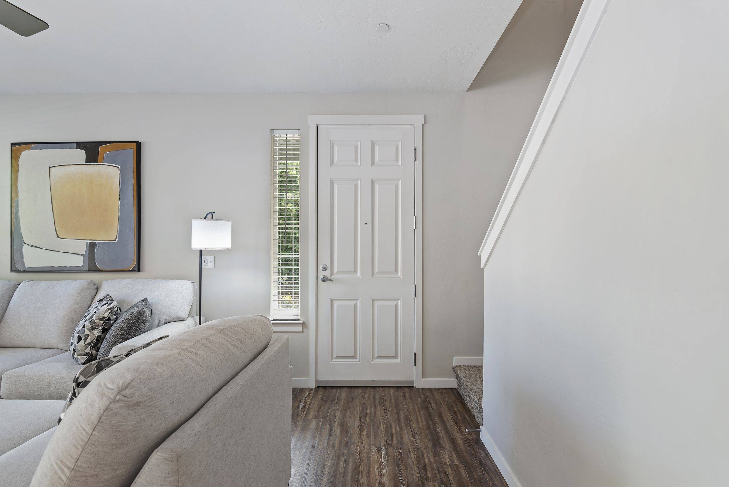 The entry and staircase inside a model townhome
